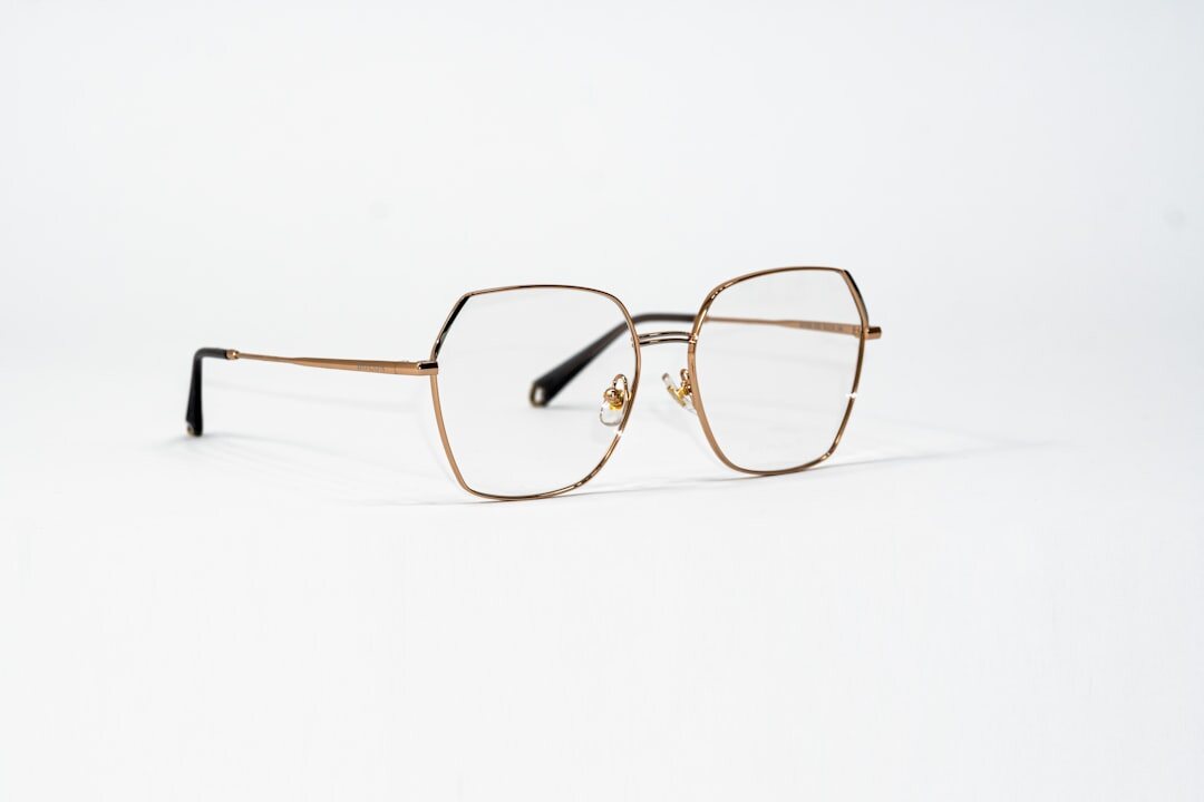 Titanium prescription eyeglasses frame on dark surface
