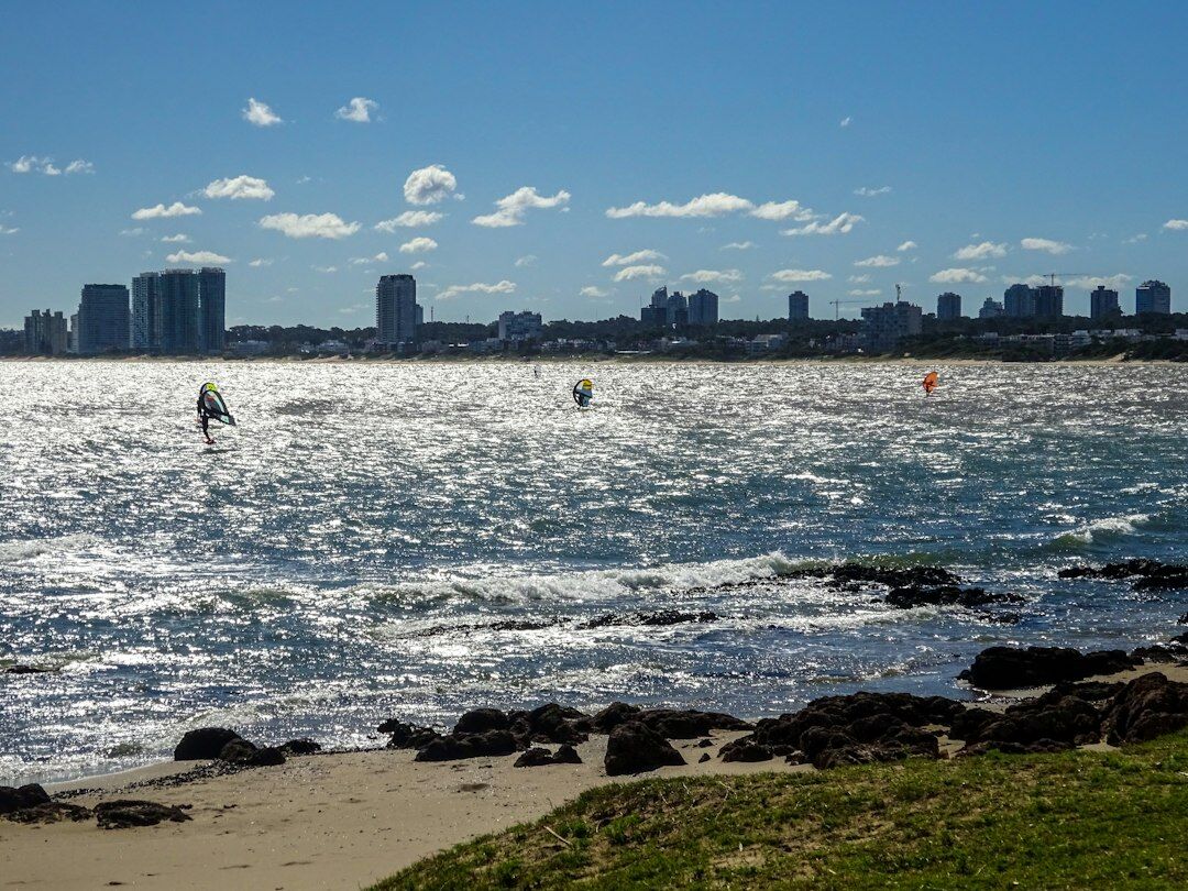Golden hour view of the coastline in Punta del Este with yachts anchored offshore