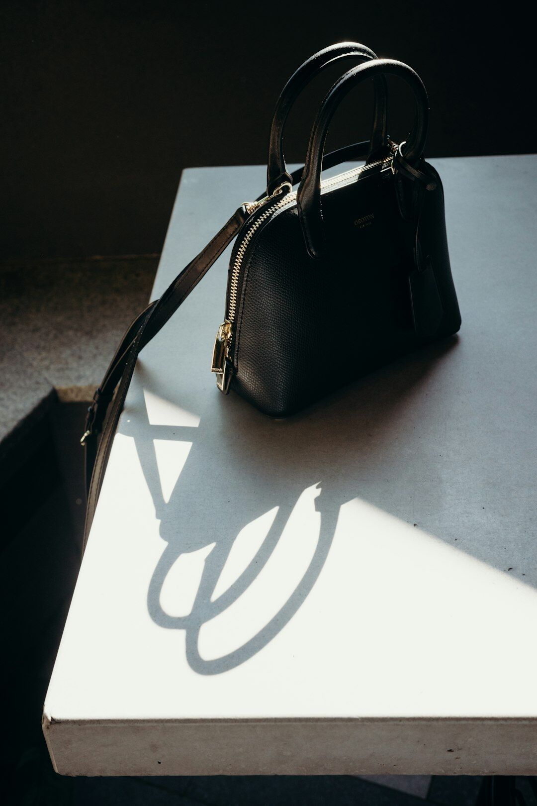 luxury handbag on table