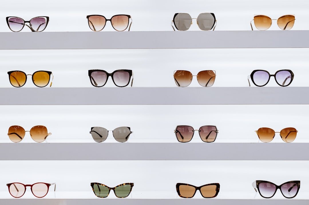Designer acetate sunglasses on marble surface