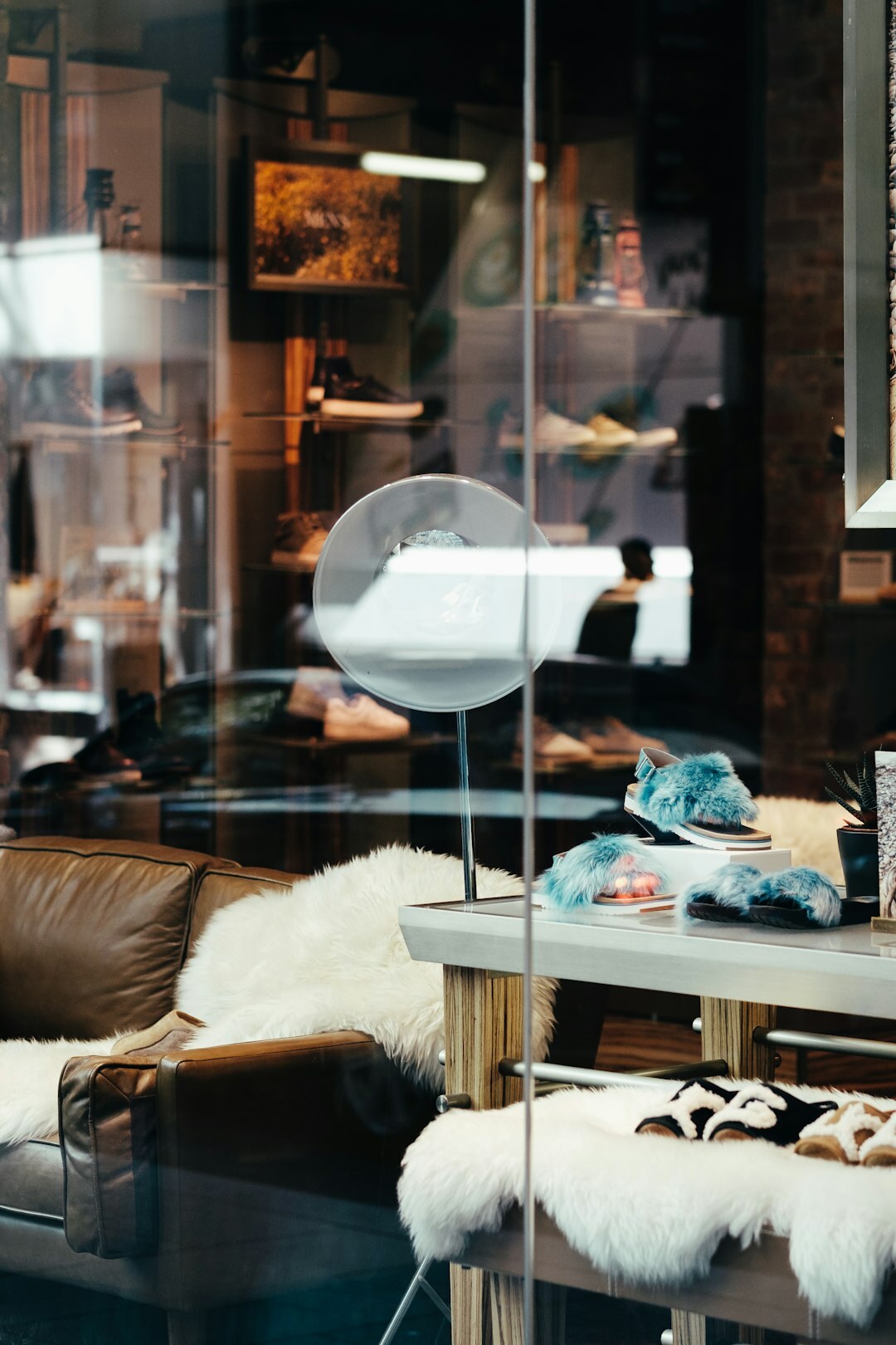 Elegant boutique storefront interior with glass display cases