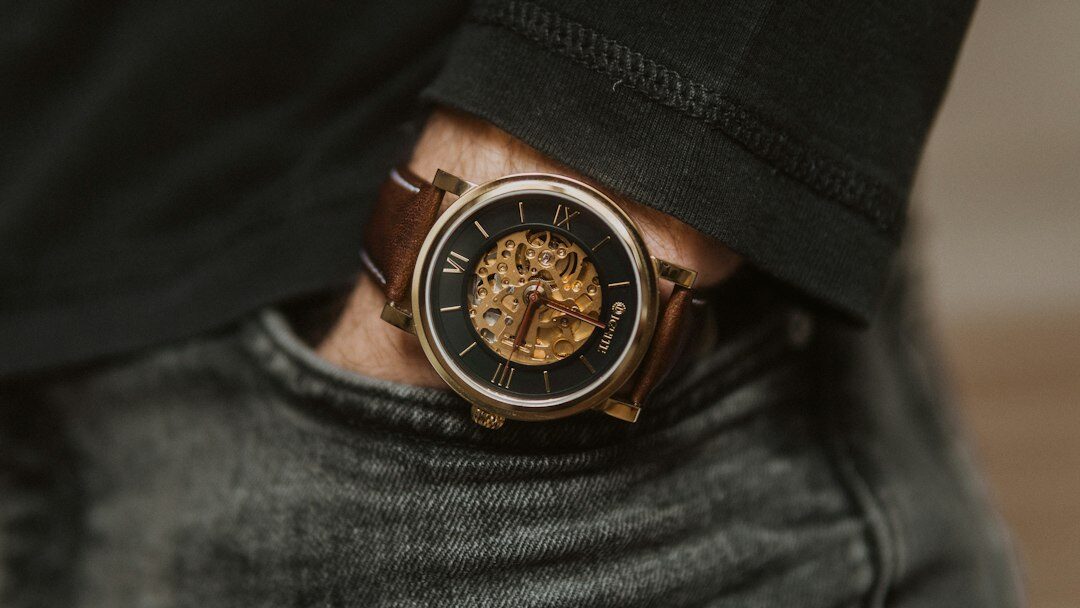 person wearing luxury watch